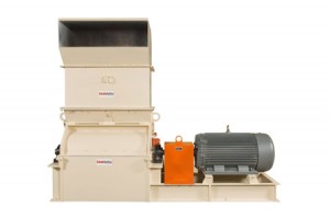 Industrial grain mill machinery with a top-loading hopper and an attached electric motor, isolated on a white background.