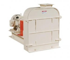 Industrial hammer mill painted in beige and red, featuring a prominent motor and grinding chamber, isolated on a white background.